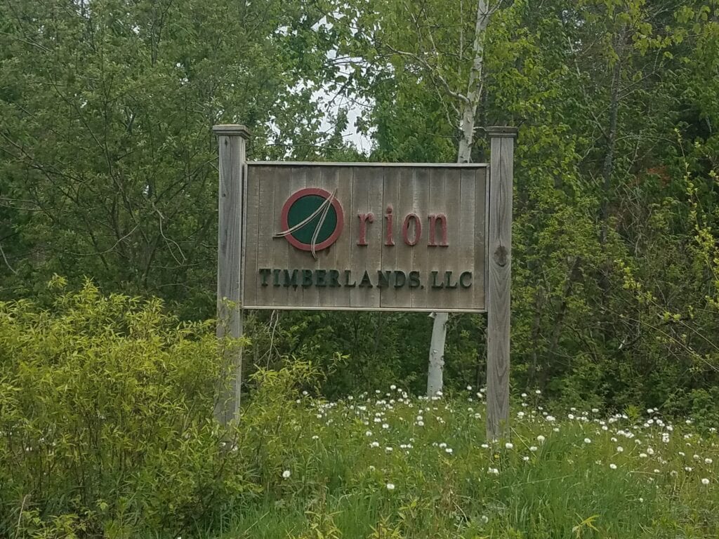 photo of orion timberlands llc wooden sign